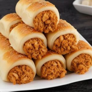 Enroladinho assado de frango (cento)